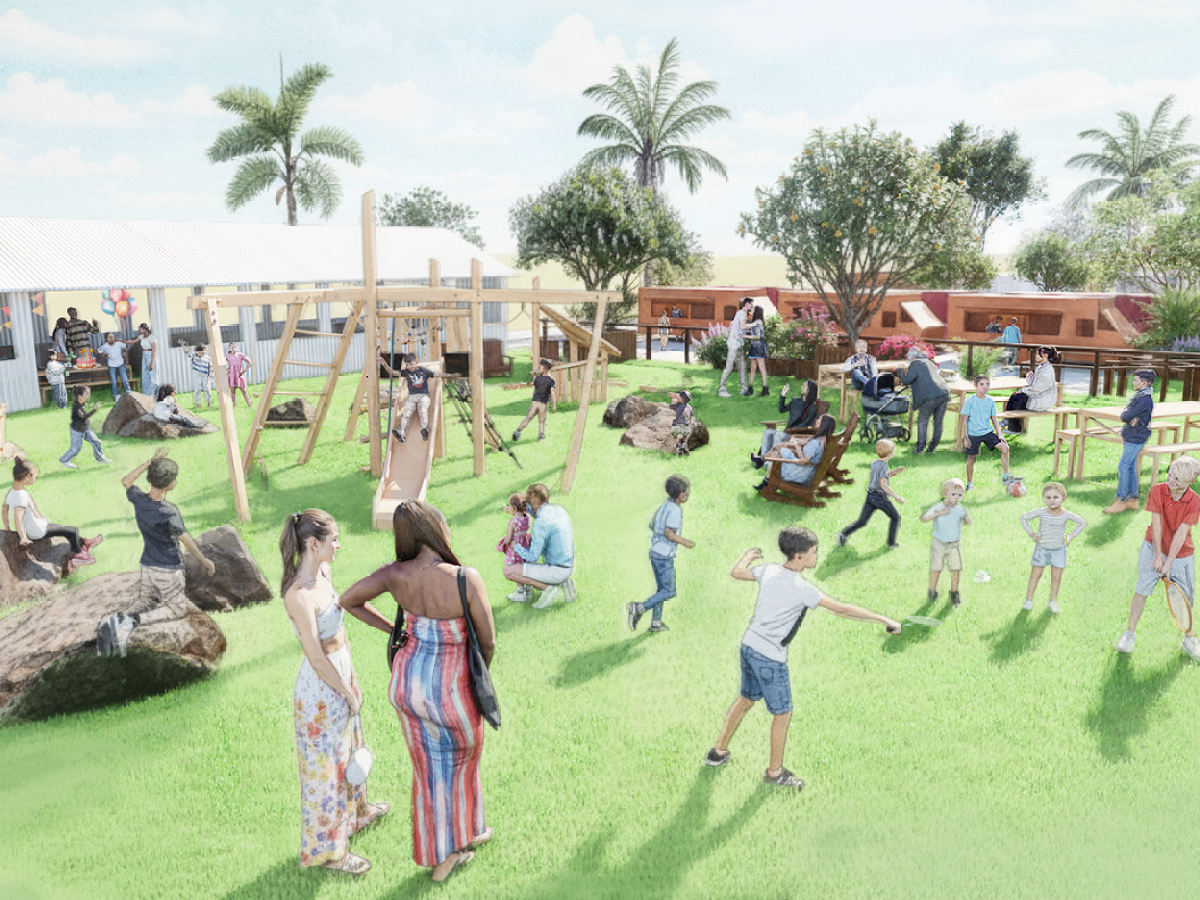 Children and adults enjoying a sunny day at a park with play structures and picnic tables.