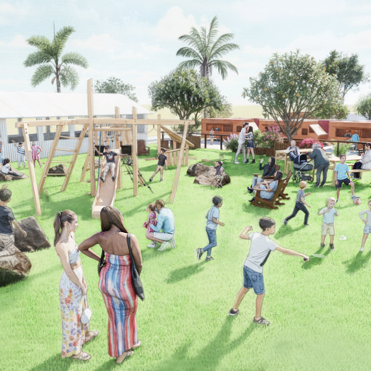 Children and adults enjoying a sunny day at a park with play structures and picnic tables.
