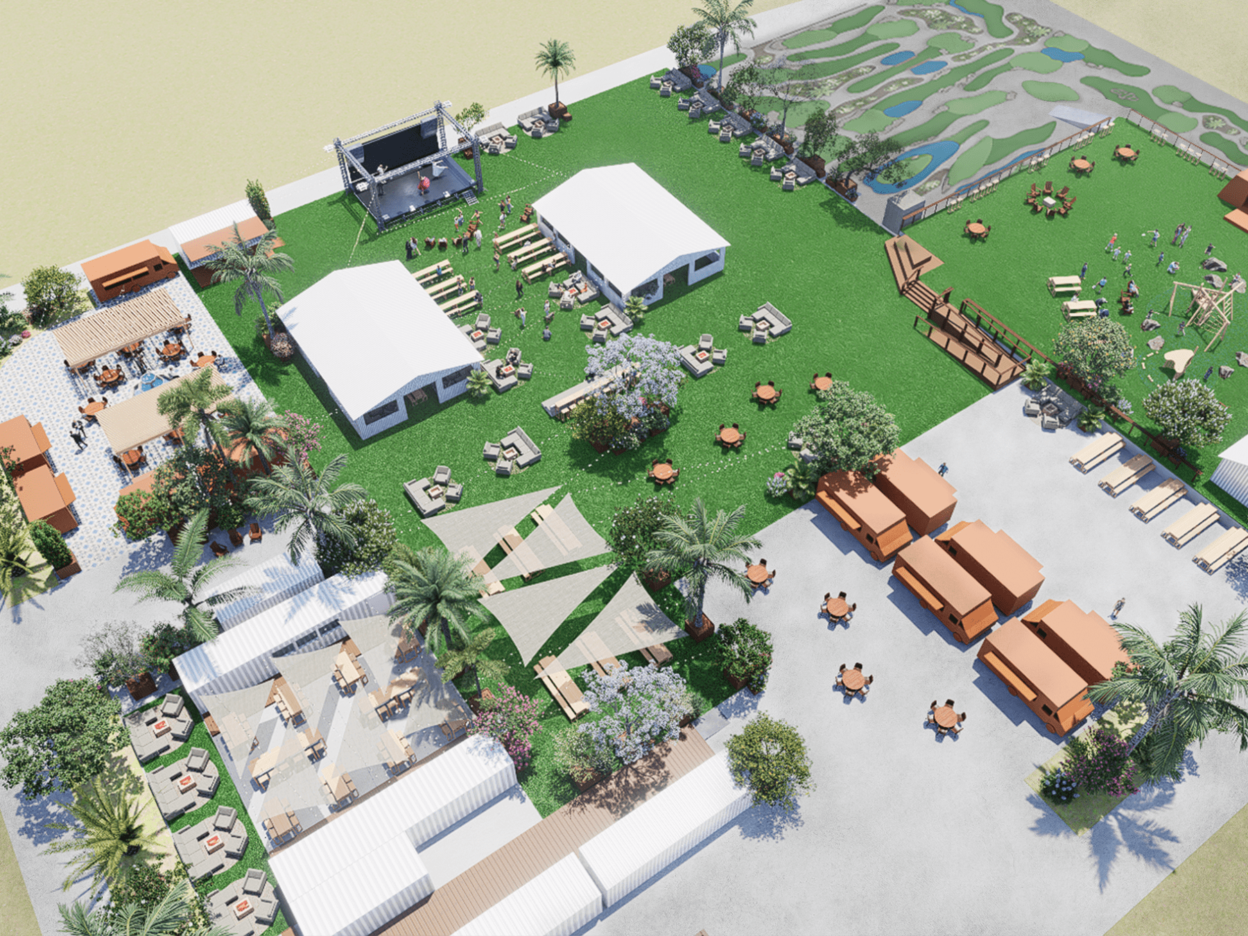 Aerial view of outdoor event space with tents, seating, and a stage on a grassy area.
